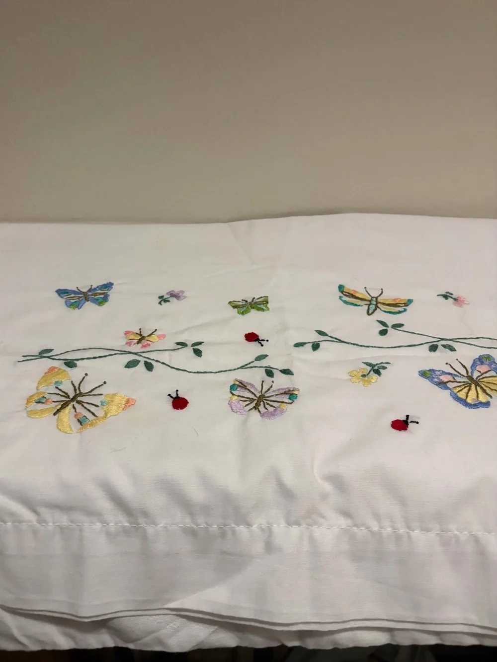 Vintage Embroidered White Standard Pillowcases Butterflies In Flight by Bucilla
